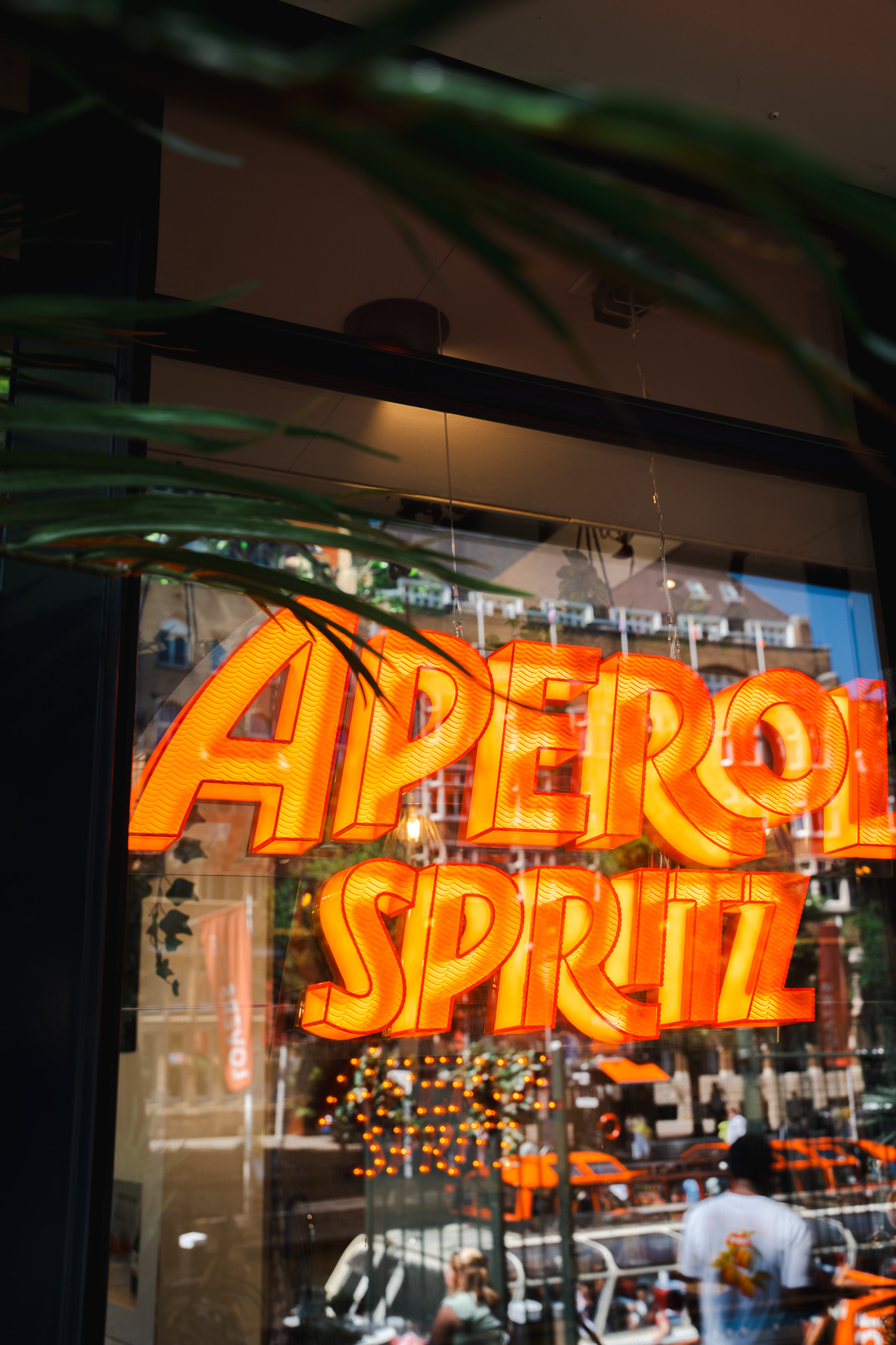 Aperol Spritz neon sign in the window of Spritz Bar Amsterdam